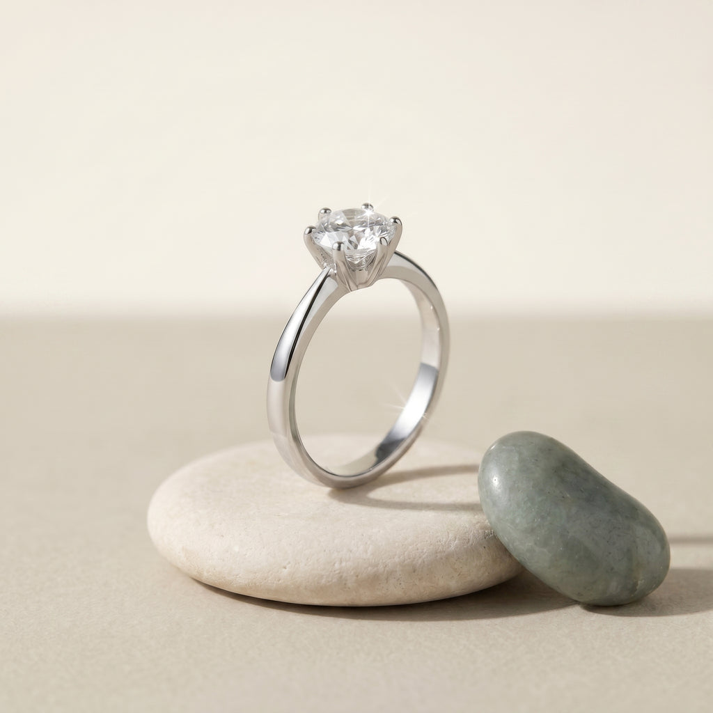 Clair Solitaire Ring · scale