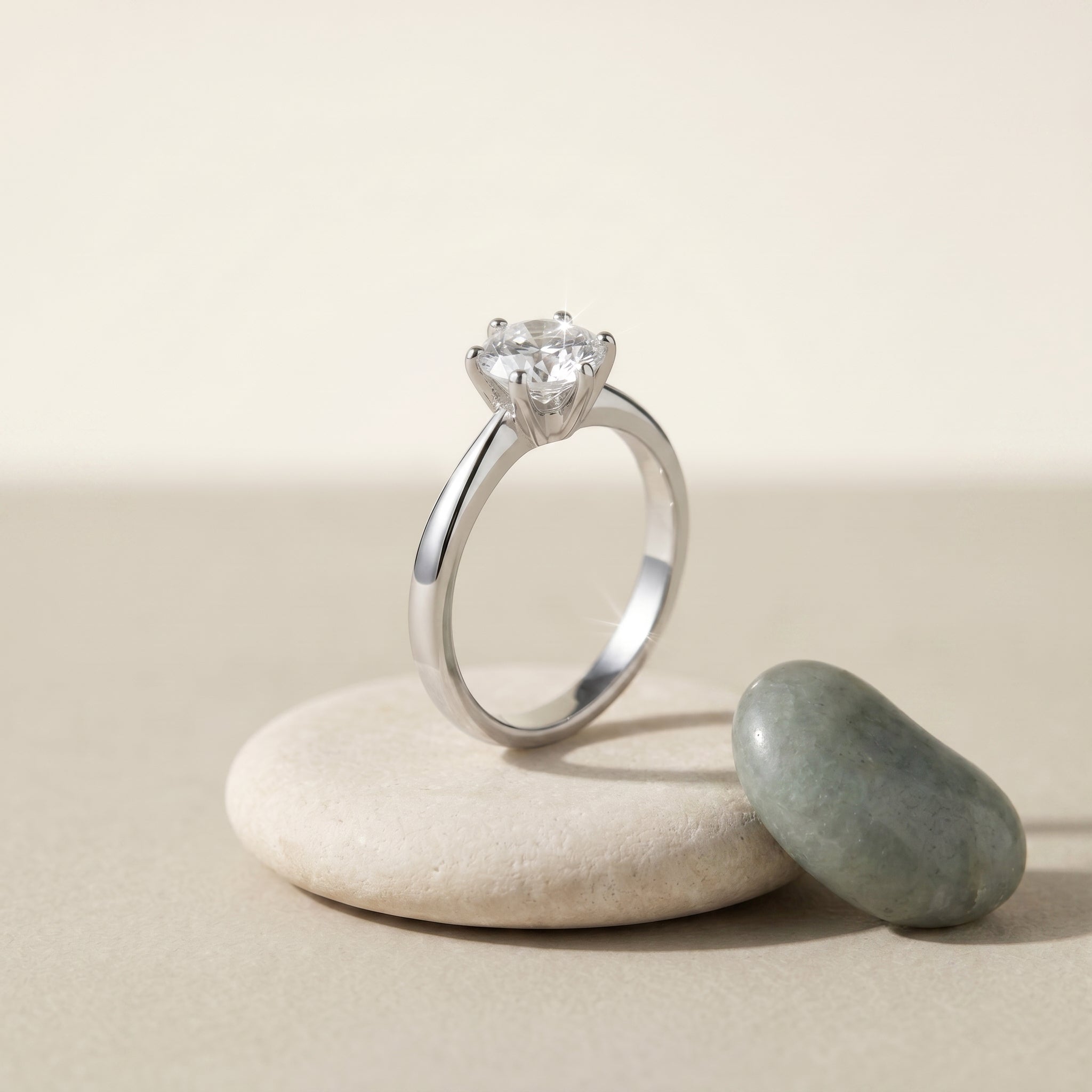 Clair Solitaire Ring · scale